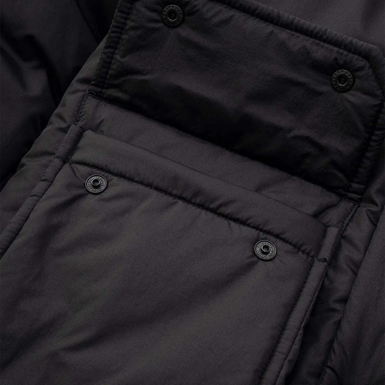 And Wander x Maison Kitsune Isolationsjacke Schwarz