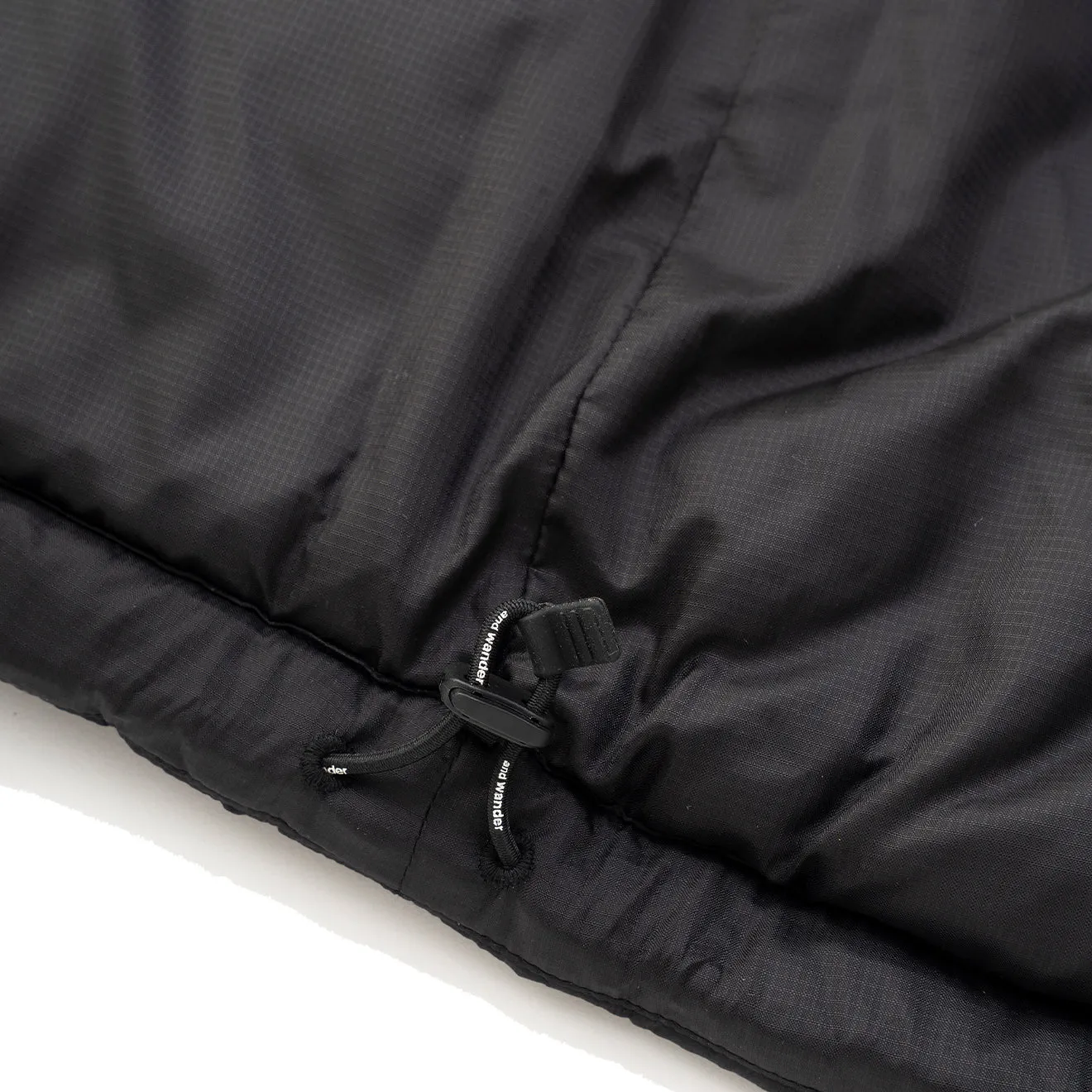 And Wander x Maison Kitsune Isolationsjacke Schwarz