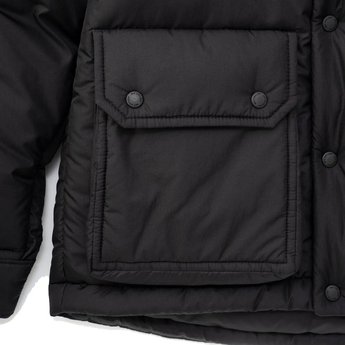 And Wander x Maison Kitsune Isolationsjacke Schwarz