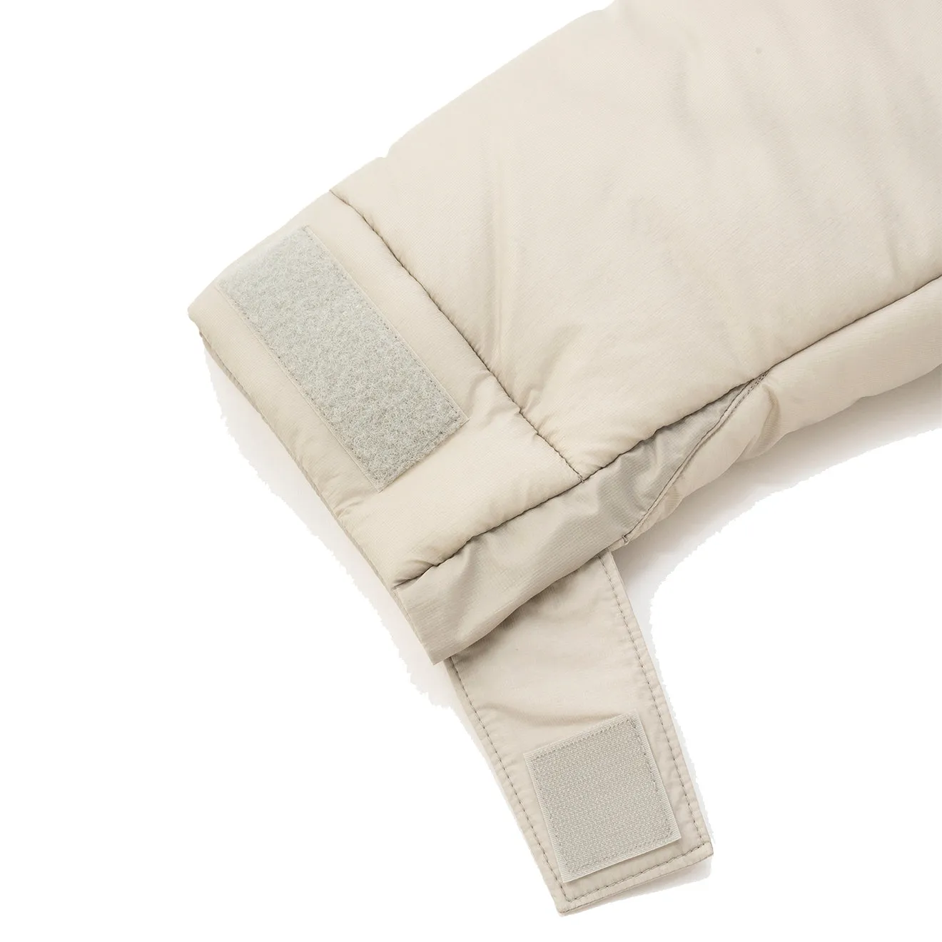 And Wander x Maison Kitsune Nordic Border Isolationsjacke Beige
