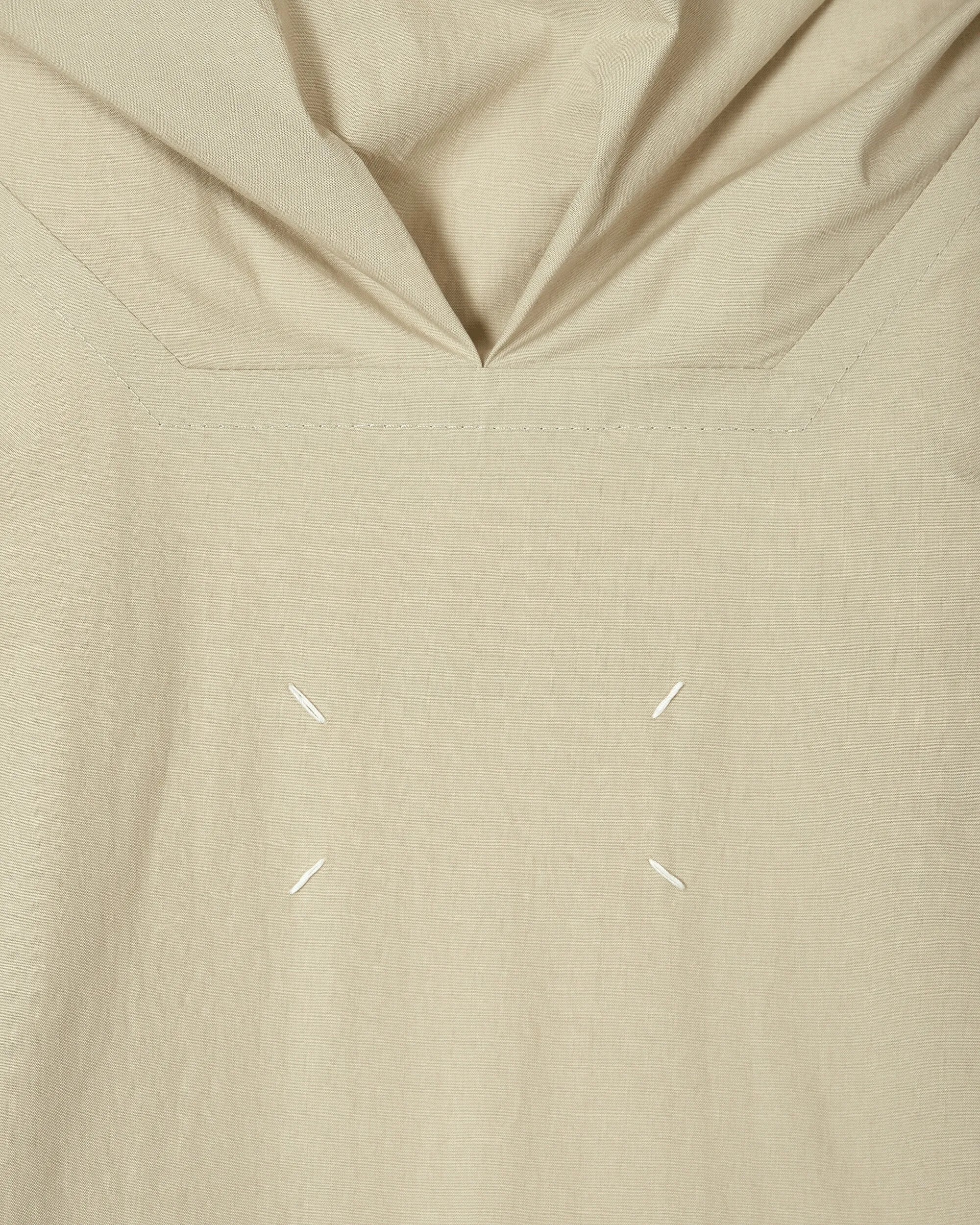 Beschichtete Baumwolljacke mit Kapuze in Beige