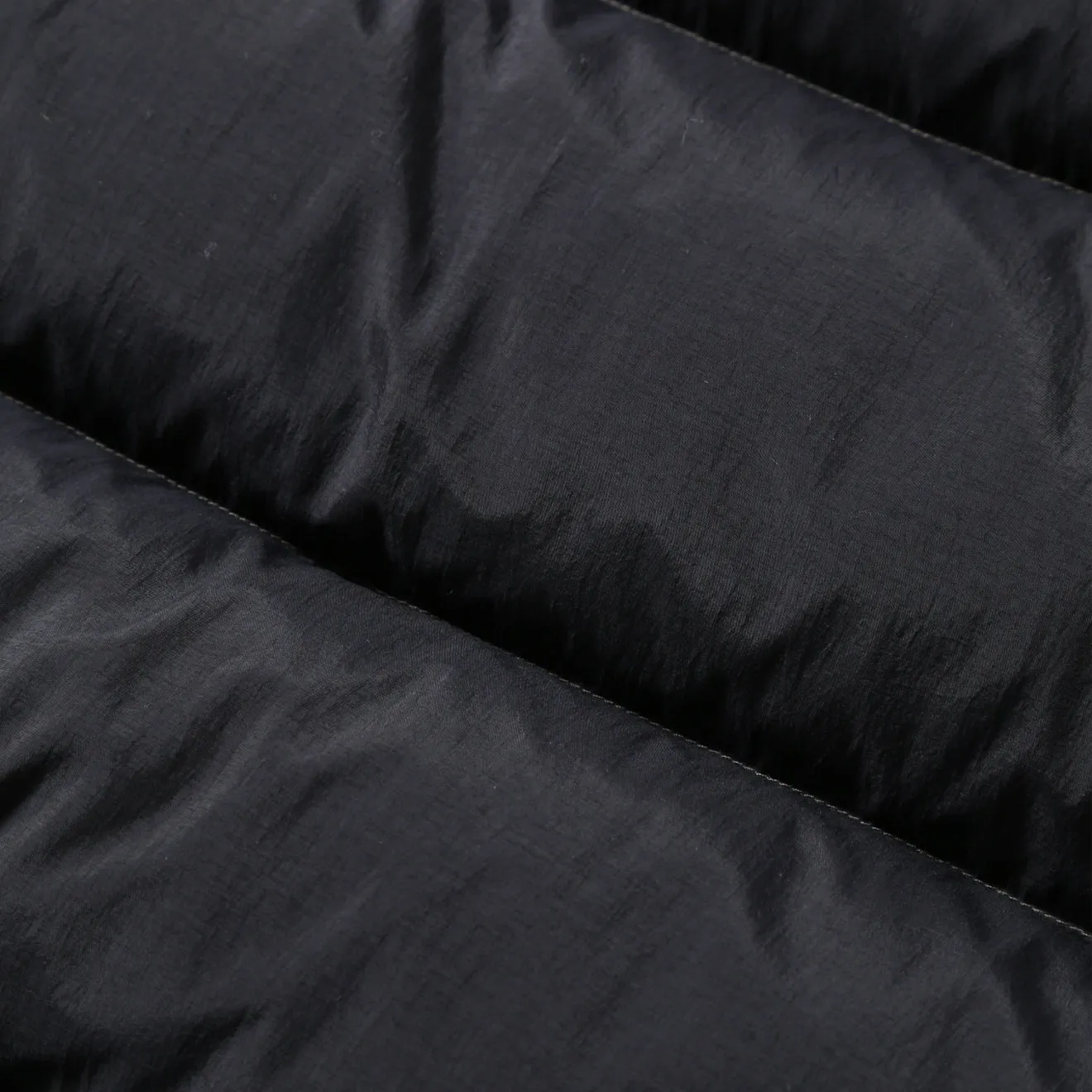Gramicci x And Wander Daunenjacke Schwarz