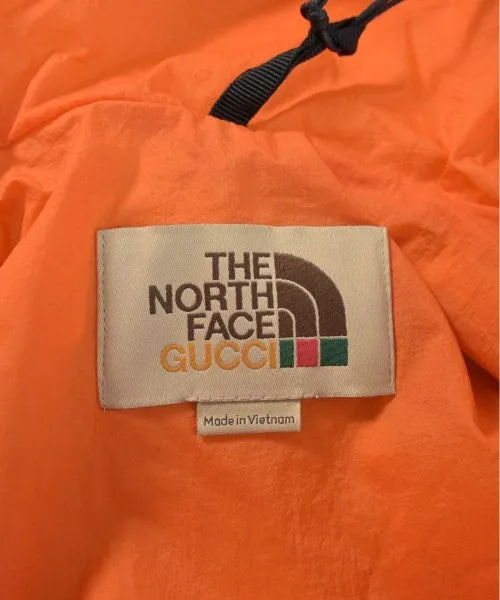 GUCCI Daunenjacken/Westen